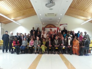 Presenters and attendees unite to elevate poverty and for a quick photo.