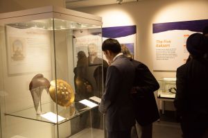 Visitors look at Sikh armour