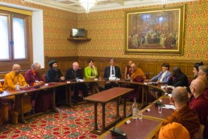 His Holiness the Dalai Lama and fellow participants during an interfaith meeting. Photo by Ian Cumming