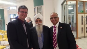 Jewish (Lior), Sikh (Mr Mandla) and Jain (Arvinder) friends have a catch-up and a group photo