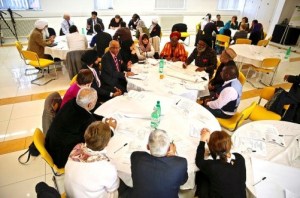 Attendees discuss Forgiveness & Reconciliation in group workshops