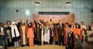 Interfaith leaders joining hands together at the Universal Sufi Temple, Katwijk.