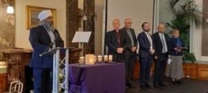 Amrick Singh, speaks on behalf of, and accompanied by, some members of the Birmingham Faith Leaders Group